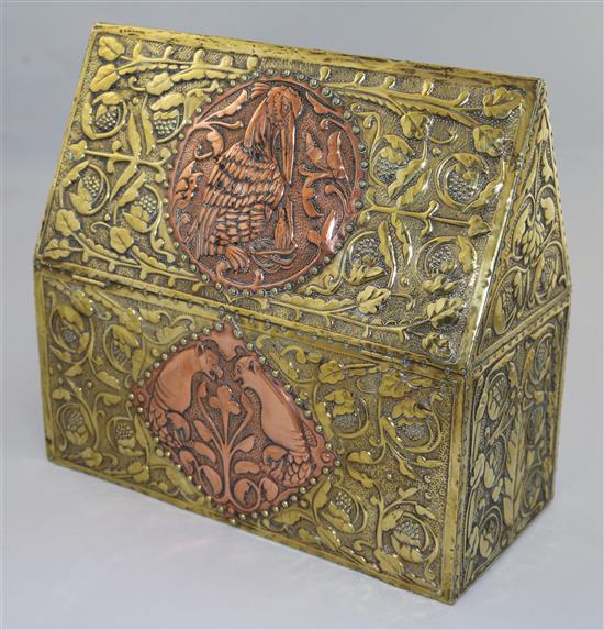 An Arts and Crafts embossed brass and copper casket, circa 1900, length 30cm, height 28cm